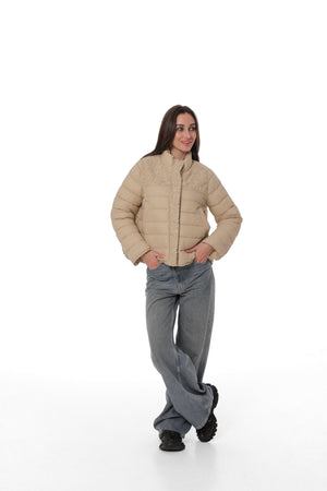 Alaska® Outerwear lightweight mid-season coat or parka in neutral color, suitable for transitional weather.