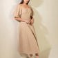 Flying Tomato taupe woven midi dress with sleeveless design and subtle textured fabric, perfect for casual or elegant occasions.