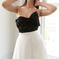 Black Blissful Breeze woven midi dress by Flying Tomato, featuring a relaxed fit and stylish woven fabric.