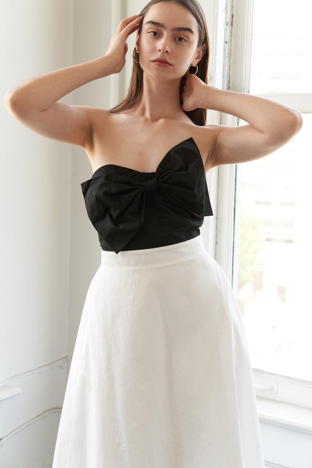 Black Blissful Breeze woven midi dress by Flying Tomato, featuring a relaxed fit and stylish woven fabric.