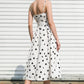 White Flying Tomato Harmony Horizon woven midi dress displayed on a hanger with a flowing, textured fabric design.