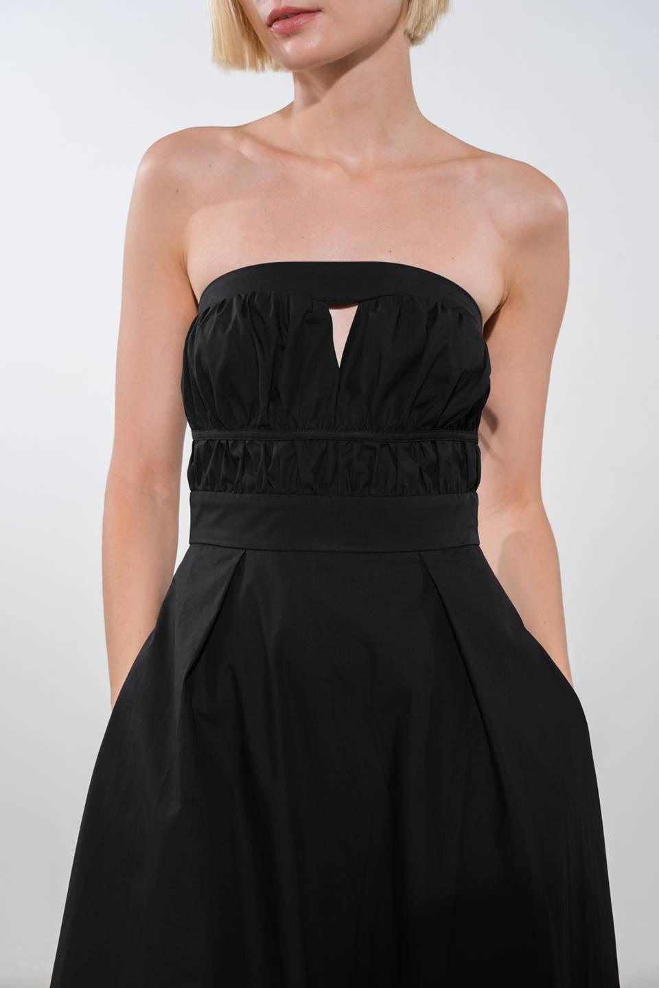 Black Mystic Muse woven midi dress by Flying Tomato, showing a flowing fabric and stylish design on a model.