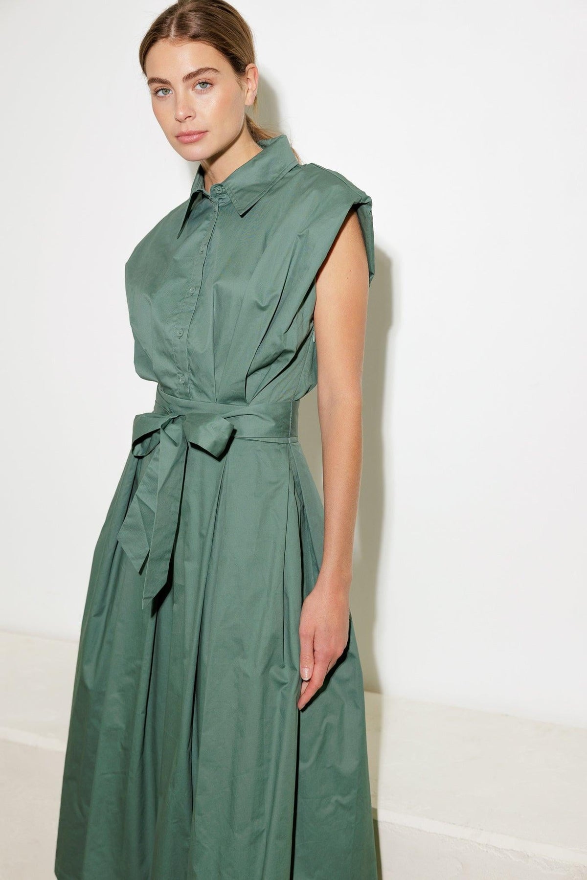 Flying Tomato Deeper Connection woven midi dress in sage green, featuring a flowy, patterned fabric and stylish fit.