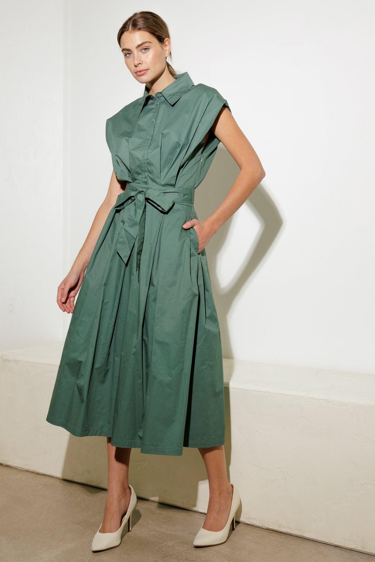 Flying Tomato Deeper Connection woven midi dress in sage green, featuring a textured fabric, sleeveless design, and a flowy silhouette.