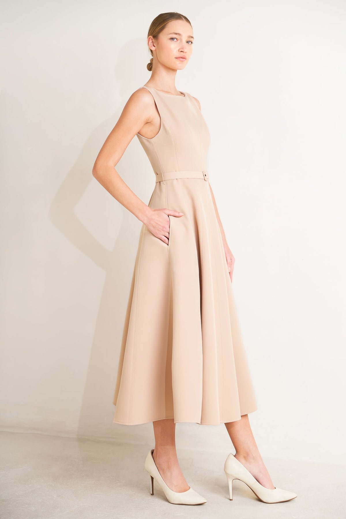 Beige woven midi dress by Flying Tomato, featuring a flowing silhouette and intricate woven fabric for a stylish look.