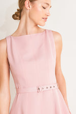 Pink woven midi dress by Flying Tomato featuring a flowy, relaxed fit and intricate woven detailing.