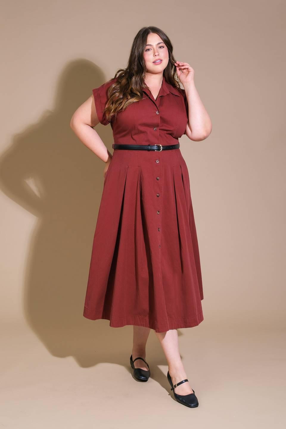 Flying Tomato Perfect Balance Woven Midi Dress in berry color, showing a stylish, knee-length dress with a fitted waist and woven fabric.