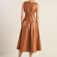 Flying Tomato Lunar Symphony faux leather midi dress in camel color, featuring a sleek, stylish design and a fitted silhouette.