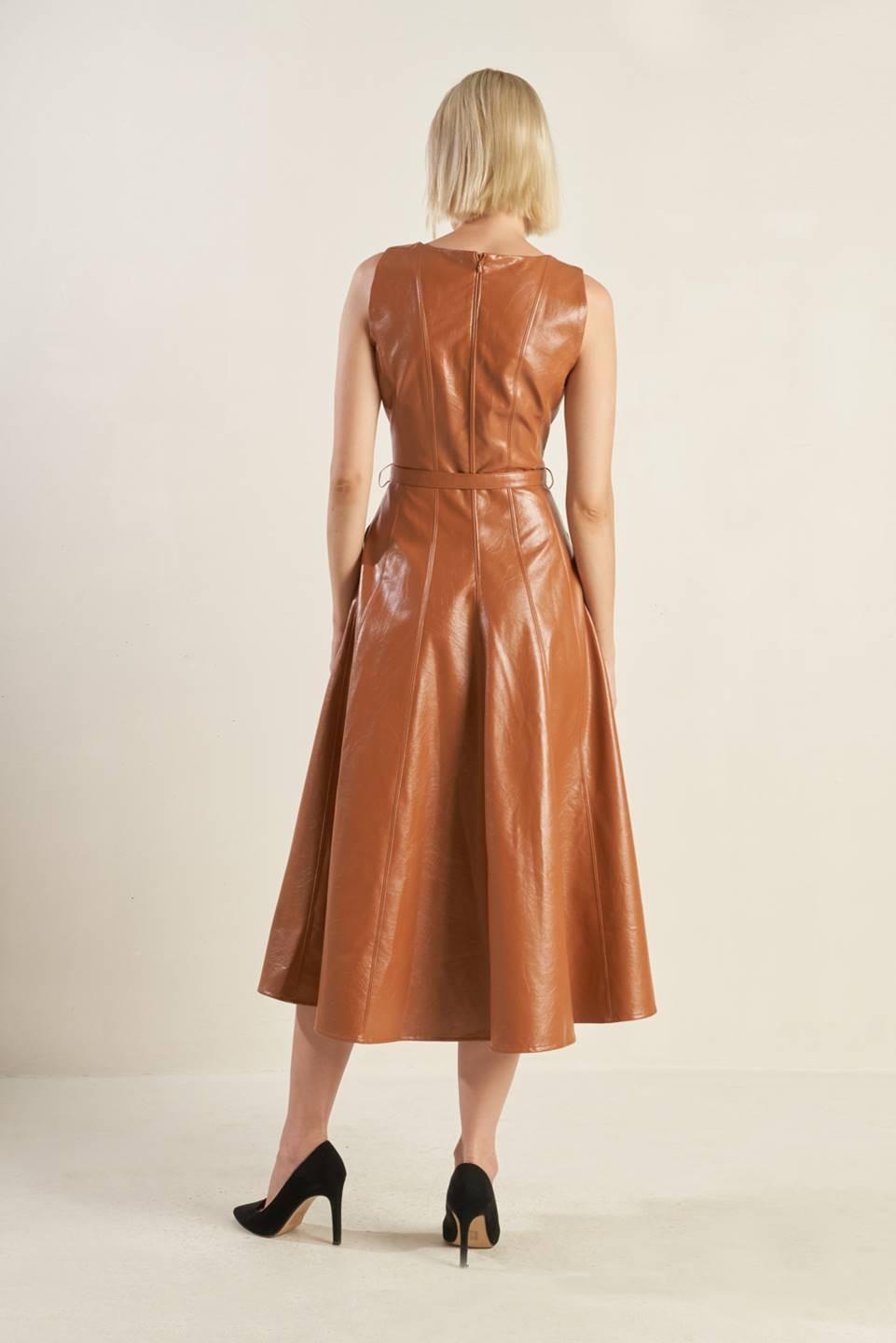 Flying Tomato Lunar Symphony faux leather midi dress in camel color, featuring a sleek, stylish design and a fitted silhouette.