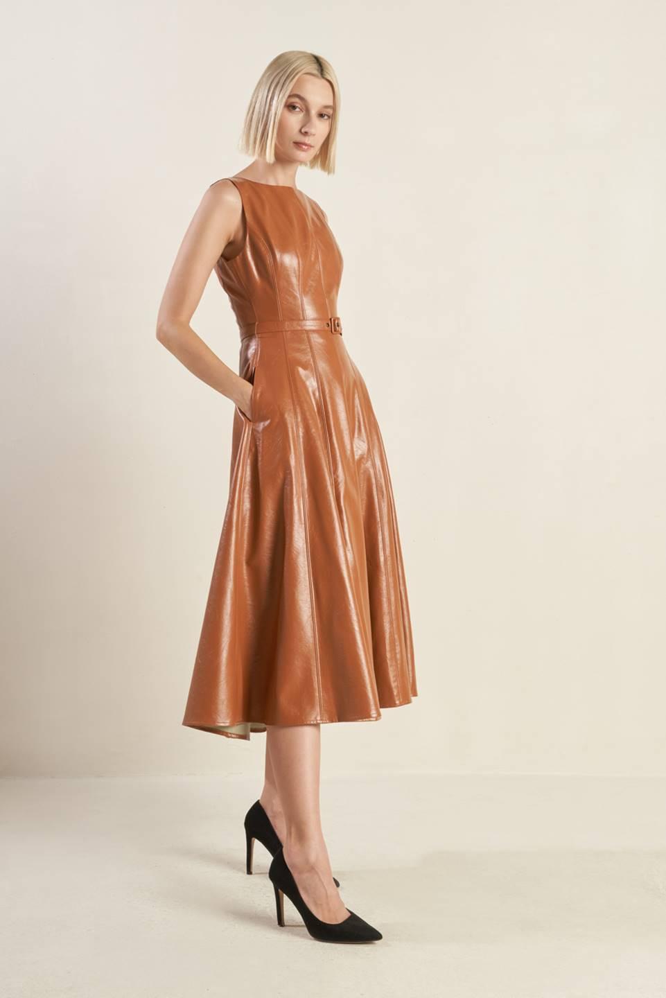 Camel faux leather midi dress by Flying Tomato, featuring a fitted silhouette and stylish design, displayed on a hanger.