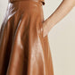 Flying Tomato Lunar Symphony faux leather midi dress in camel color, stylish and fitted with long sleeves and a sleek silhouette.