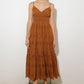 Brown Luminous Bliss woven eyelet midi dress by Flying Tomato, featuring intricate eyelet details and a flowing silhouette.