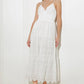 Off-white luminous bliss woven eyelet midi dress by Flying Tomato, featuring a flowing design with intricate eyelet details.