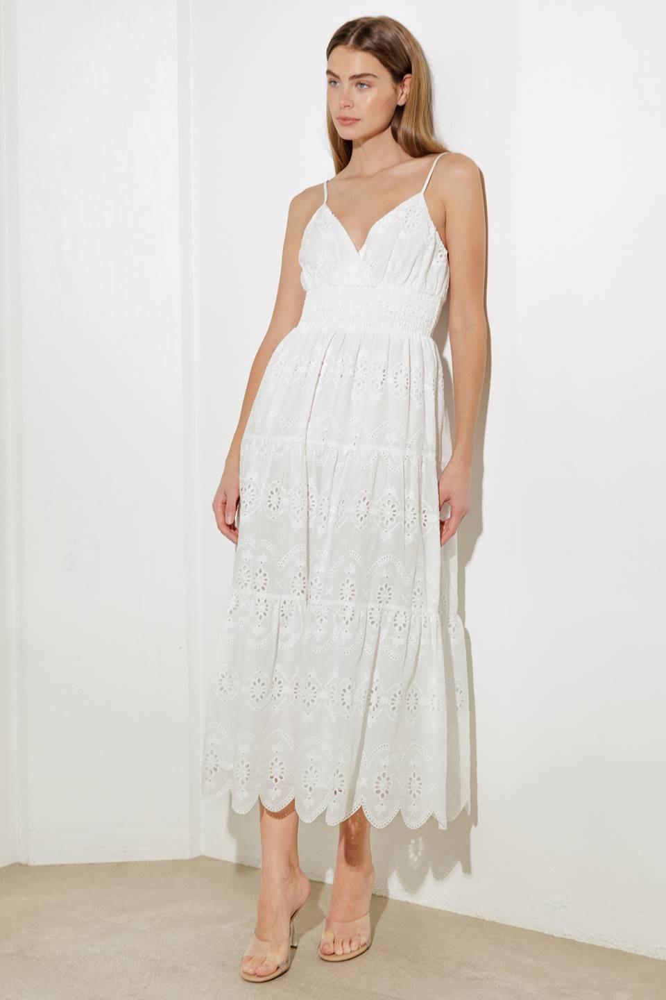 Off-white luminous bliss woven eyelet midi dress by Flying Tomato, featuring a flowing design with intricate eyelet details.