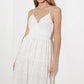 Off-white Luminous Bliss woven eyelet midi dress by Flying Tomato, featuring intricate eyelet details and a flowing silhouette.