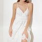 Off-white luminous bliss woven eyelet midi dress by Flying Tomato, featuring delicate eyelet details and a flowing silhouette.
