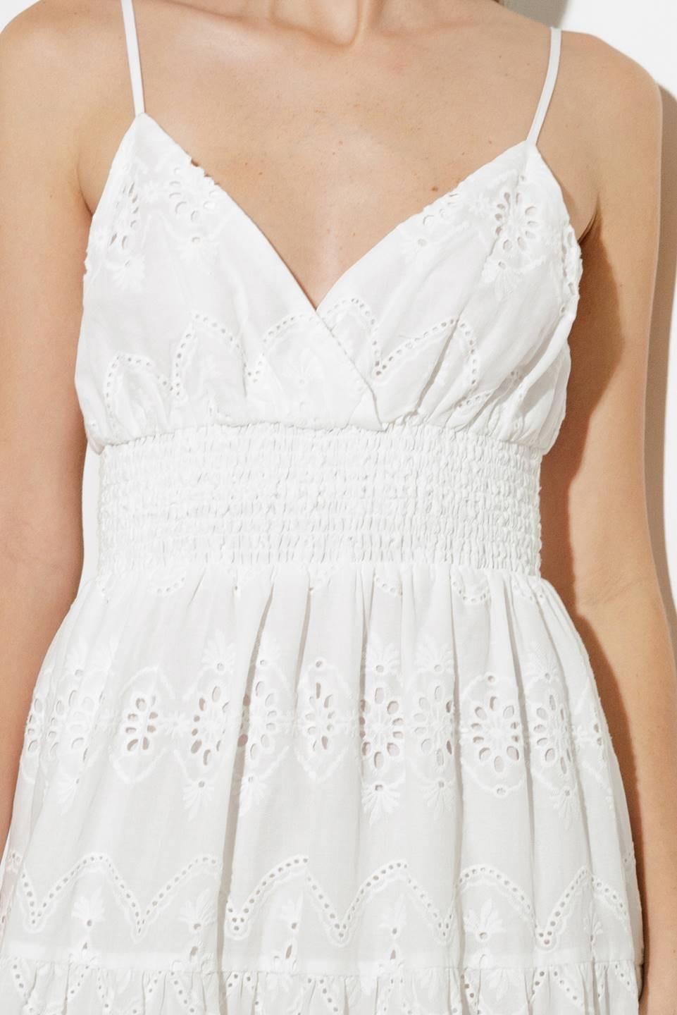 Off-white luminous bliss woven eyelet midi dress by Flying Tomato, featuring intricate eyelet details and a flowing silhouette.