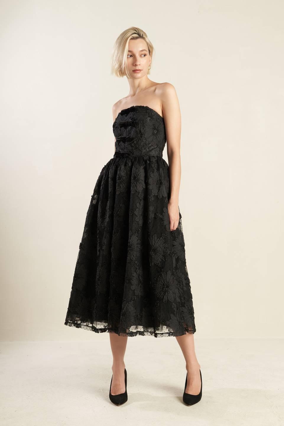 Black Confidence Game lace midi dress by Flying Tomato, featuring intricate lace details and a fitted silhouette.