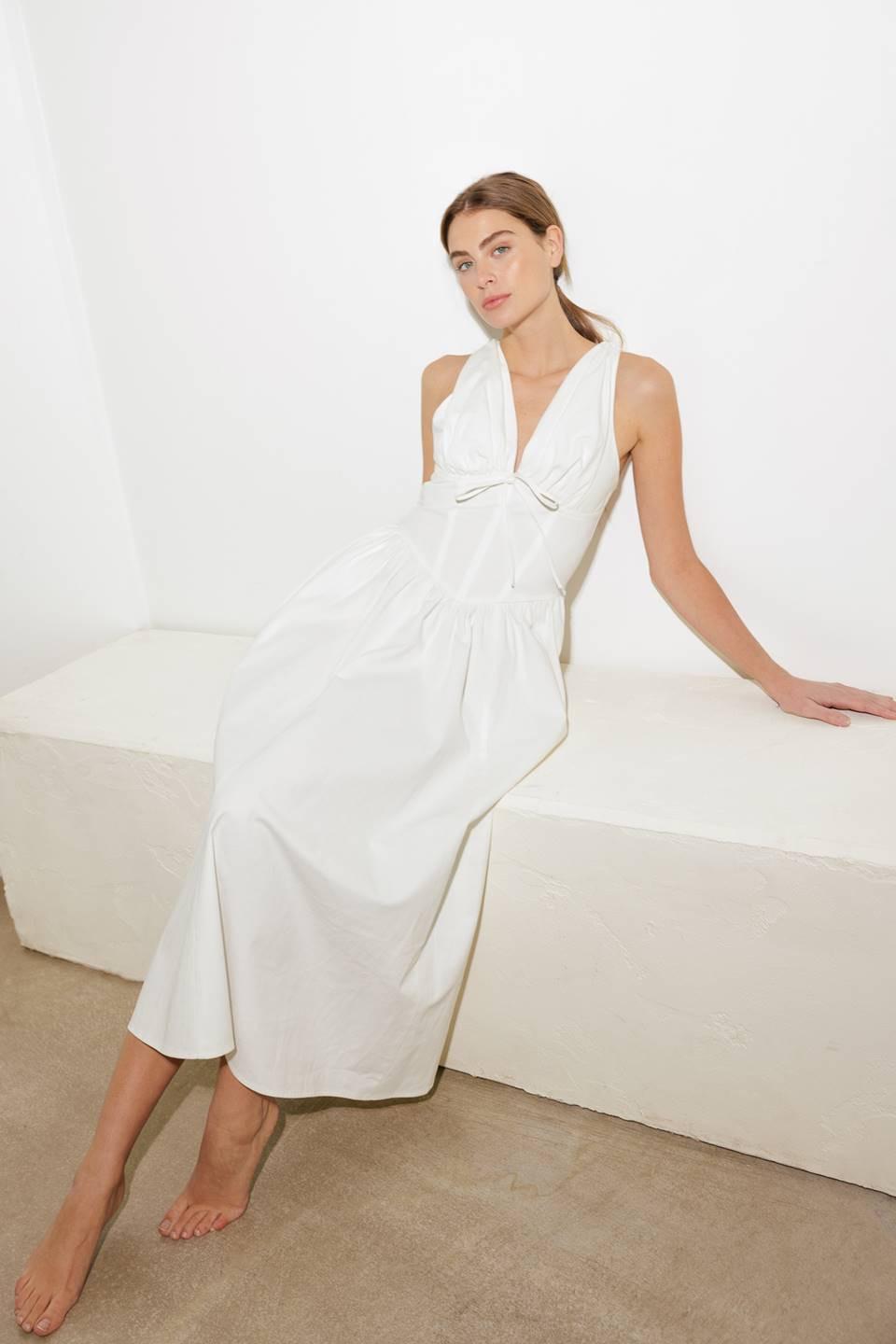 Flying Tomato Fanciful Escapes woven midi dress in white with a flowing, patterned fabric and sleeveless design.