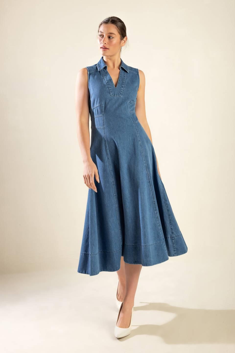 Flying Tomato Genevieve denim midi dress displayed on a hanger with front view showing classic medium wash and button details.