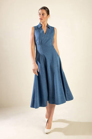 Flying Tomato Genevieve denim midi dress displayed on a hanger with front view showing classic medium wash and button details.