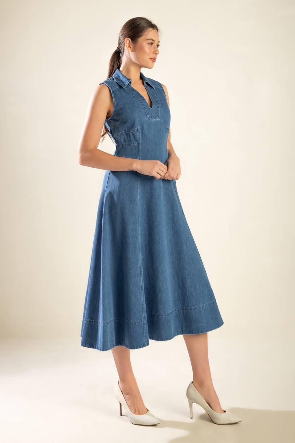 Flying Tomato Genevieve denim midi dress shown in medium wash with a fitted bodice and flowing skirt.