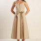 Taupe Margot Dream woven midi dress by Flying Tomato, featuring a flowing design and detailed fabric texture.