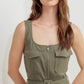 Flying Tomato Olive Grove Woven Midi Dress displayed on a model, featuring a relaxed fit and woven fabric in olive green.
