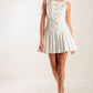 Flying Tomato white woven mini dress, stylish sleeveless dress with a fitted bodice and flared skirt, perfect for casual summer wear.