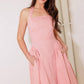 Flying Tomato pink woven midi dress with ruffled sleeves, styled for a casual, rainy-day look, perfect for spring and summer wear.