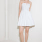 White Flying Tomato Pure Romance woven mini dress with short sleeves and a fitted silhouette, perfect for casual summer wear.