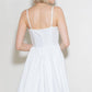 White Flying Tomato Pure Romance woven mini dress with short sleeves and a fitted silhouette, ideal for casual summer wear.