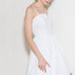Flying Tomato Pure Romance woven mini dress in white, stylish sleeveless dress with a flowy fabric and trendy design.