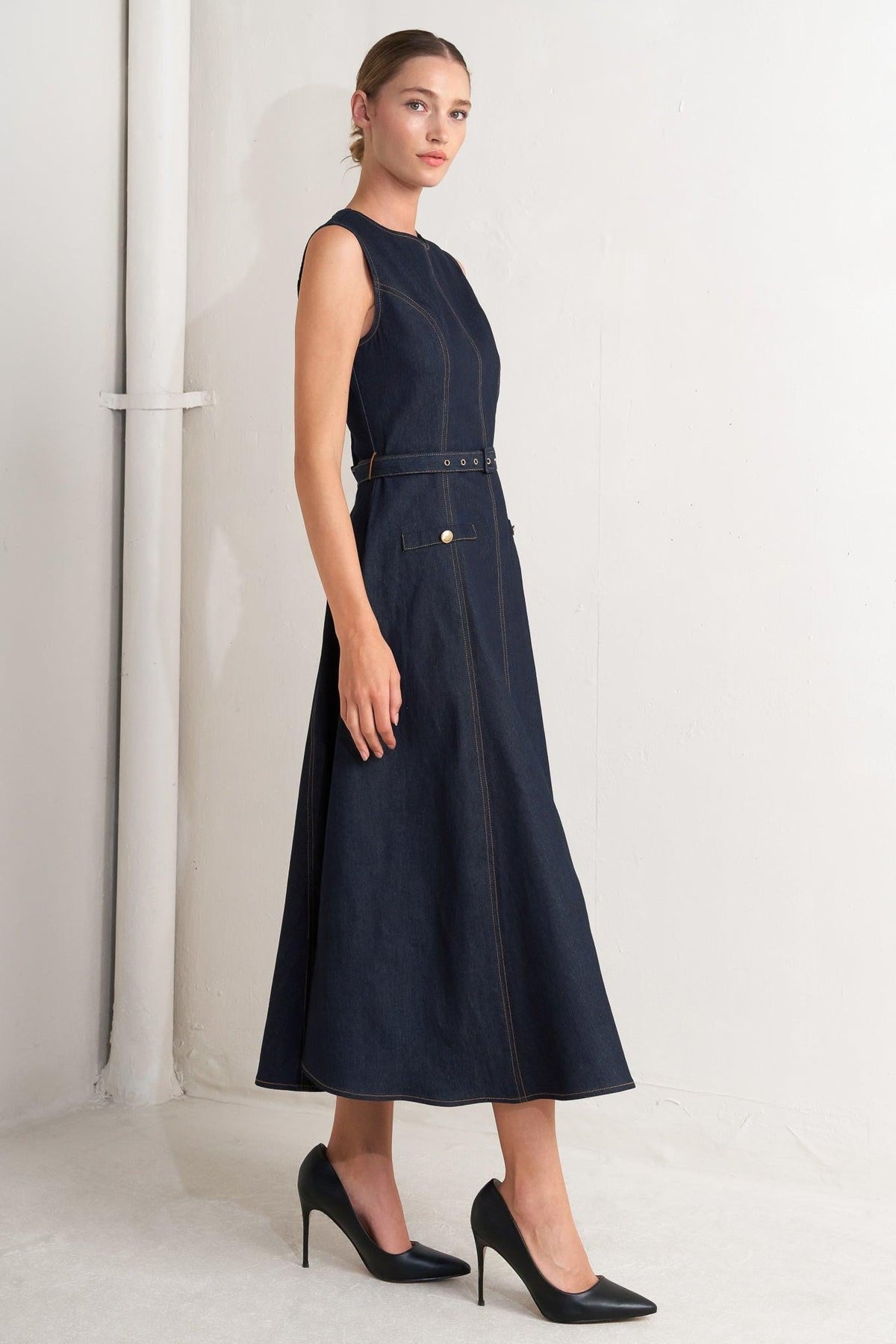 Dark denim midi dress by Flying Tomato featuring a sleek modern design and a fitted silhouette.