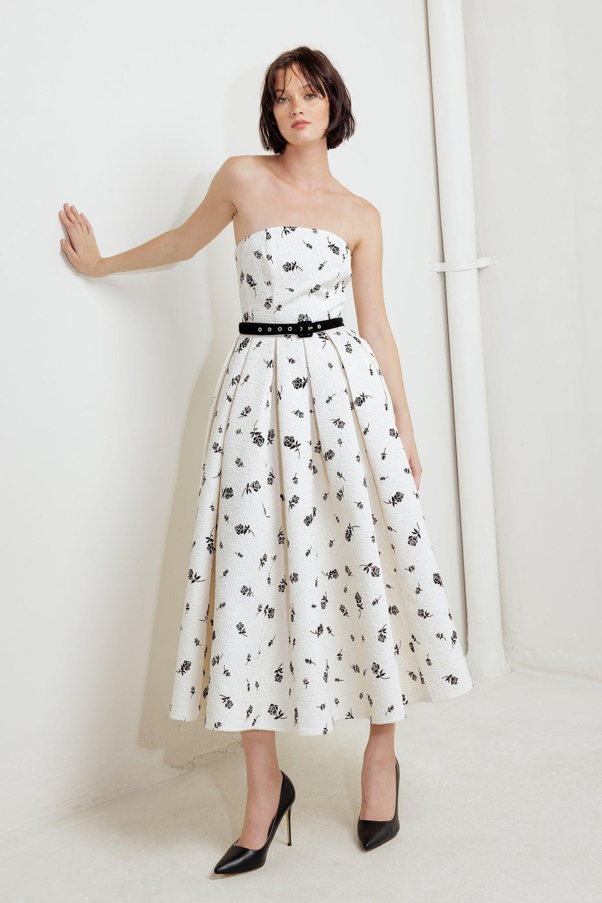 Cream and black woven midi dress by Flying Tomato featuring a cultivated, elegant design with a flowing silhouette.