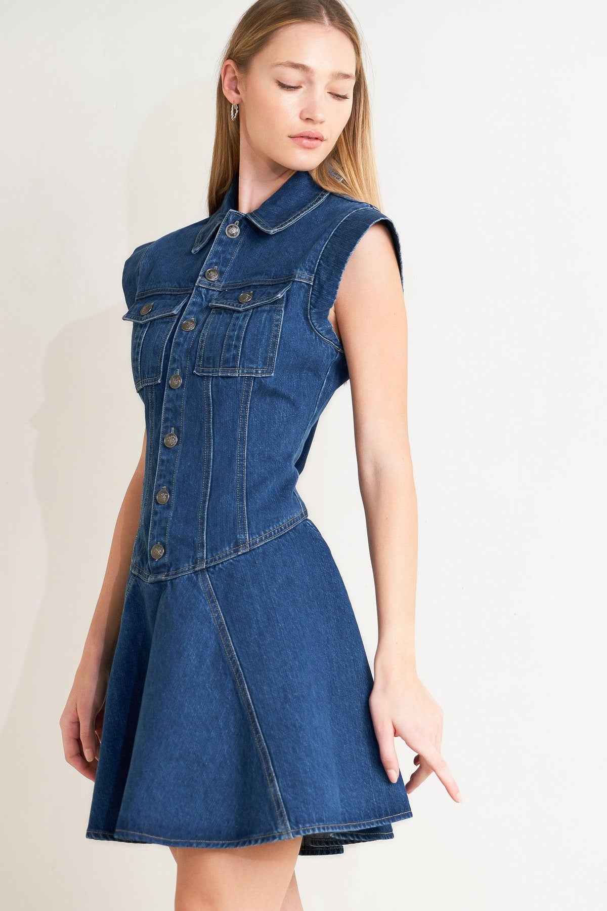 Blue Crush Denim Mini Dress by Flying Tomato, stylish sleeveless denim dress with a fitted silhouette and casual design.