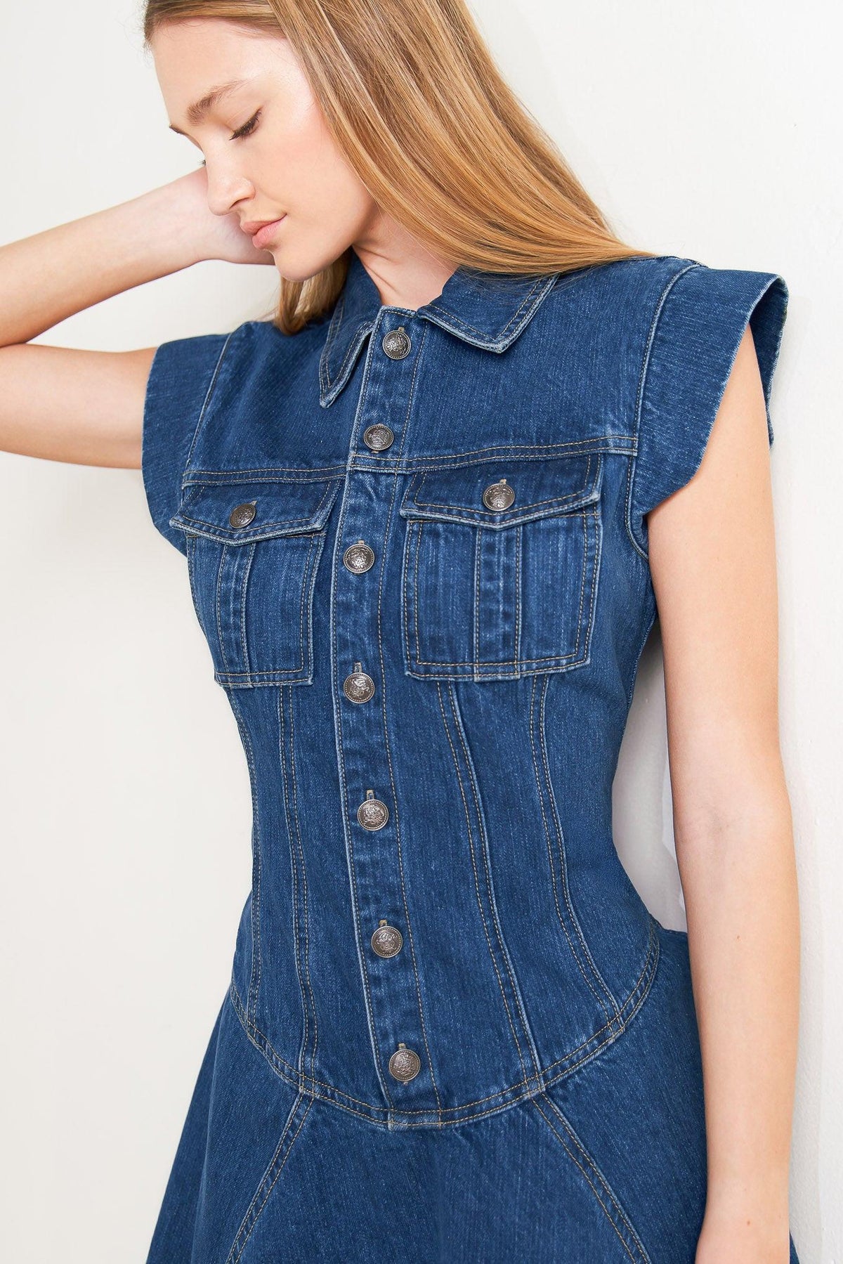Flying Tomato blue crush denim mini dress with long sleeves and button front, displayed on a hanger.