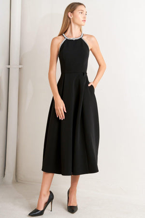 Flying Tomato Galaxy Charm Woven Midi Dress in black, featuring a flowing, patterned fabric and a stylish midi length.