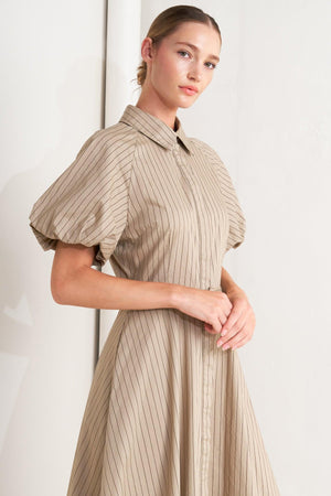 Taupe woven midi dress by Flying Tomato featuring a classic neutral design and elegant, flowing silhouette.