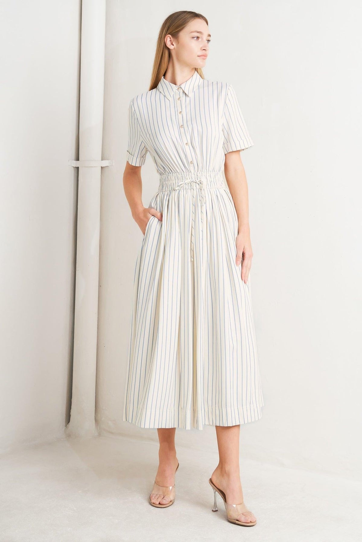 Flying Tomato Sunday Stripe woven midi dress in ivory and blue with a fitted waist and knee-length hem.
