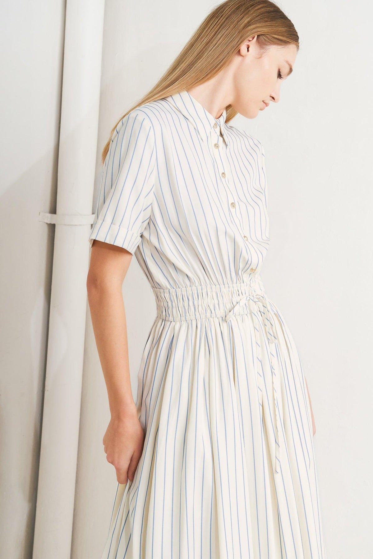 Flying Tomato Sunday Stripe Woven Midi Dress in ivory and blue with a striped pattern, sleeveless design, and midi length.