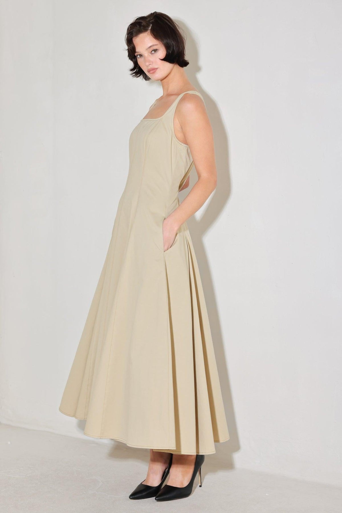 Beige Sandstone Serenade woven midi dress by Flying Tomato, showing the flowing fabric and elegant design.