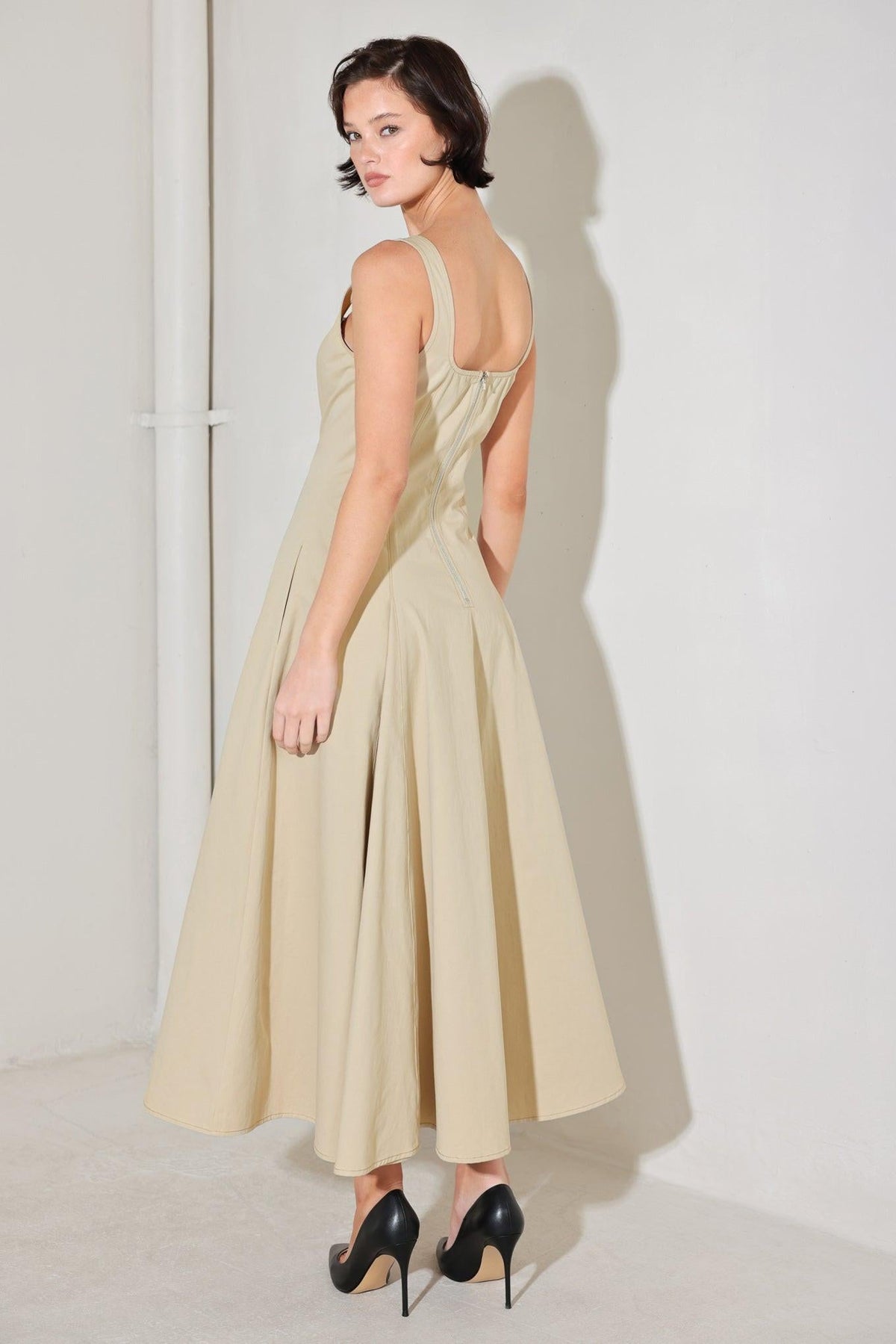 Beige Sandstone Serenade woven midi dress by Flying Tomato, featuring a flowy, patterned fabric and a flattering midi length.