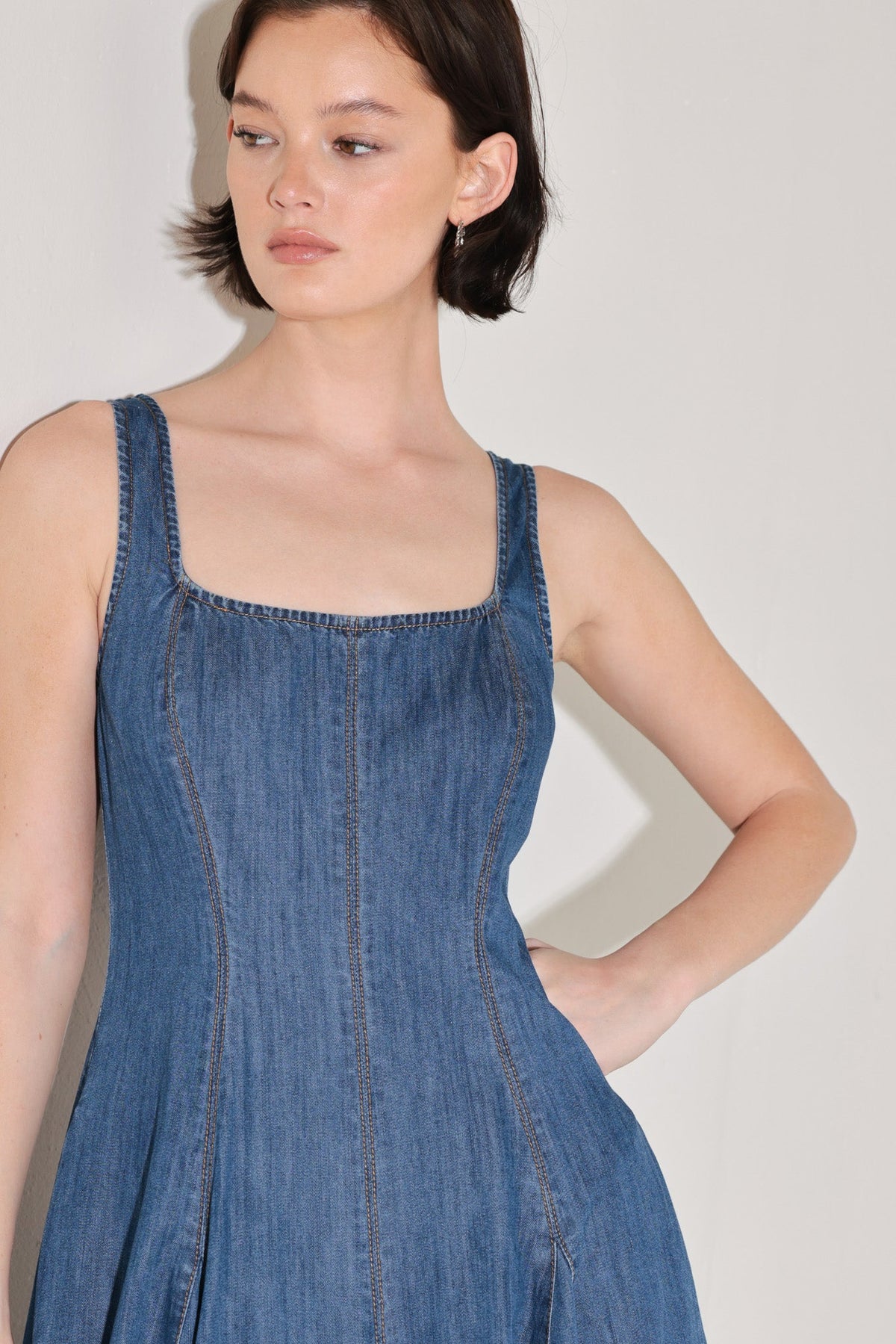 Flying Tomato Indigo Sway Denim Midi Dress, knee-length with a fitted waist and sleeveless design, casual summer style.