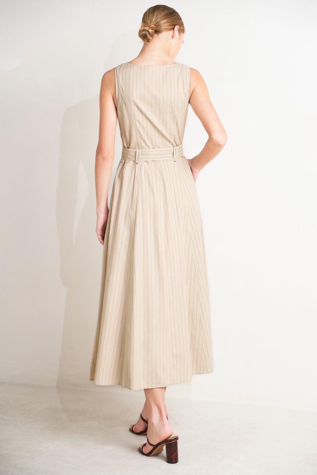 Flying Tomato tailored sunlight woven midi dress in taupe and black, shown with its elegant, flowy fabric and fitted waist.