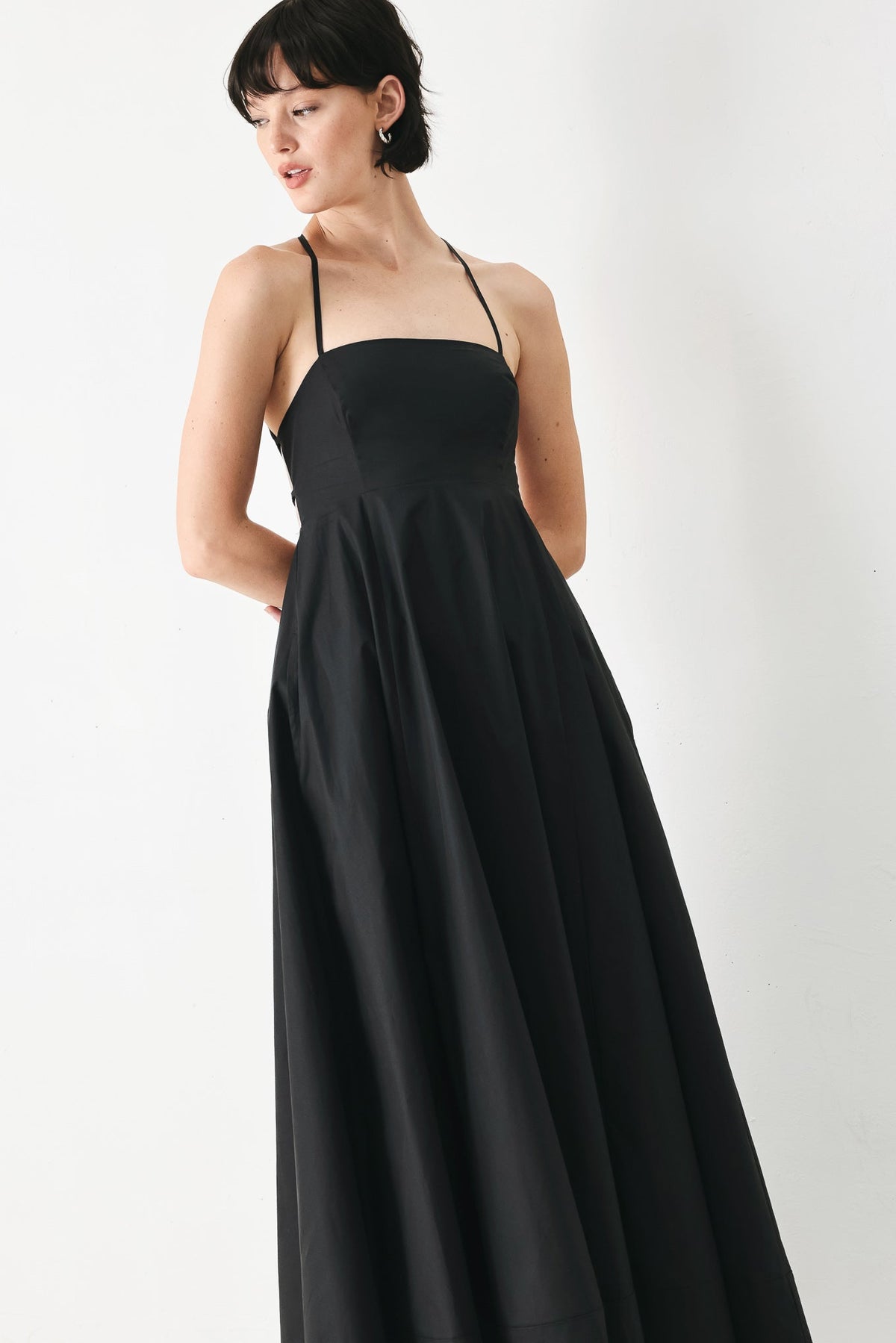 Black woven midi dress by Flying Tomato featuring a relaxed fit and stylish design, perfect for casual or semi-formal wear.