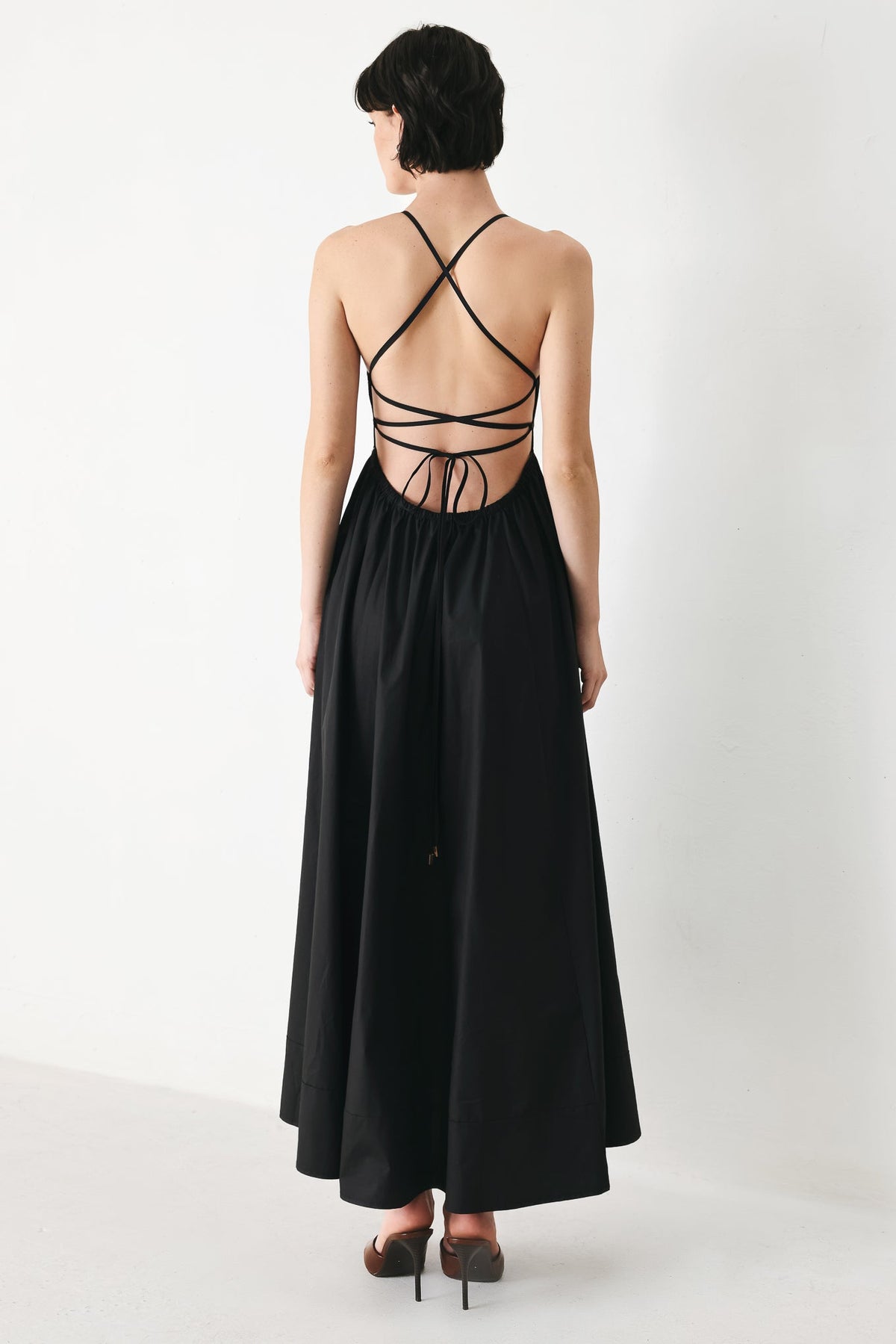 Flying Tomato Pure Line woven midi dress in black, featuring a stylish, comfortable dress with a flowing silhouette.