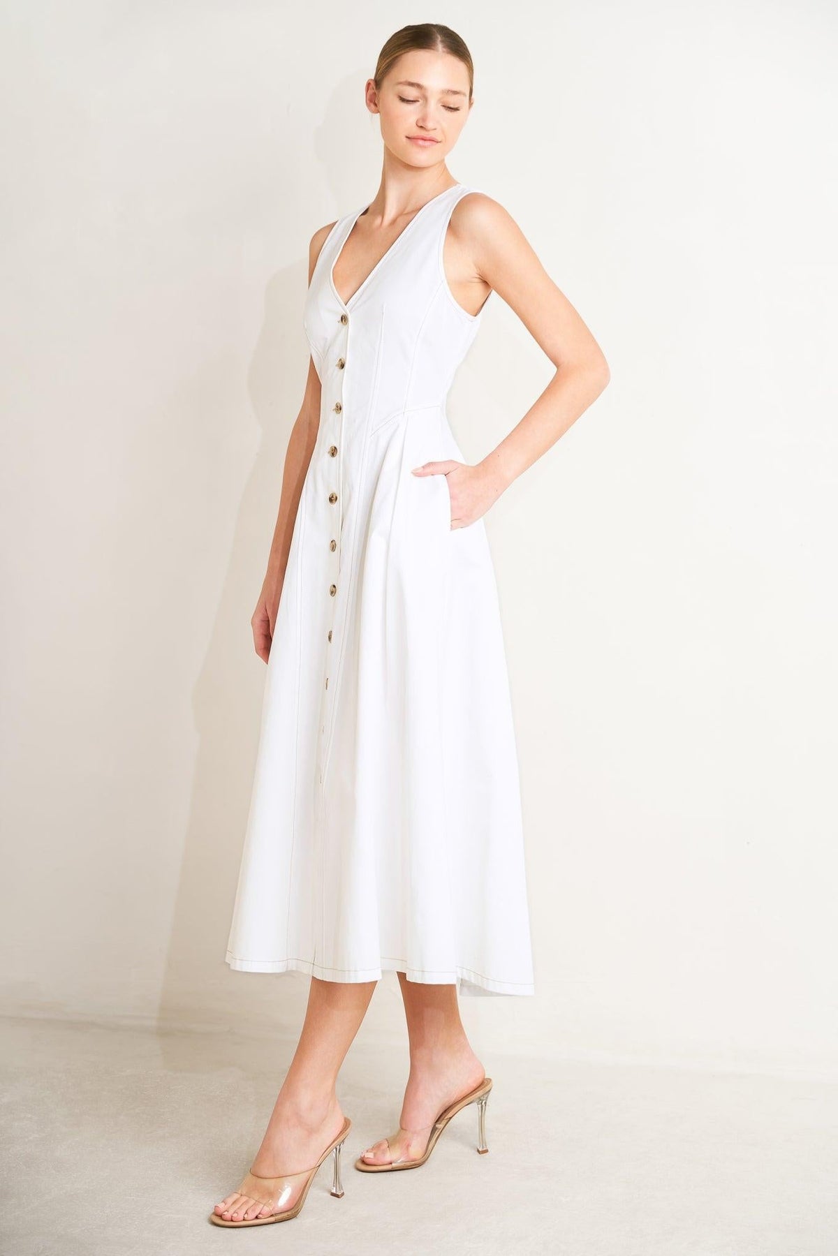 White woven midi dress by Flying Tomato, elegantly styled with a fitted bodice and flowing skirt, perfect for casual or semi-formal wear.