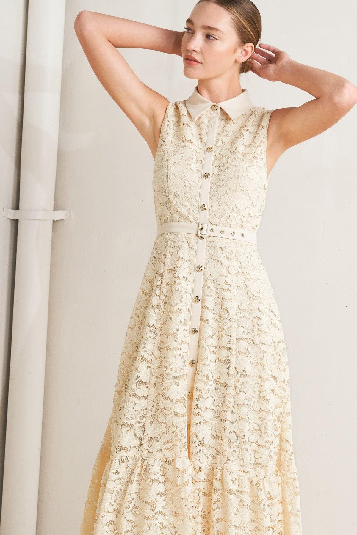 Cream woven lace midi dress by Flying Tomato featuring intricate lace details and a flowing silhouette.