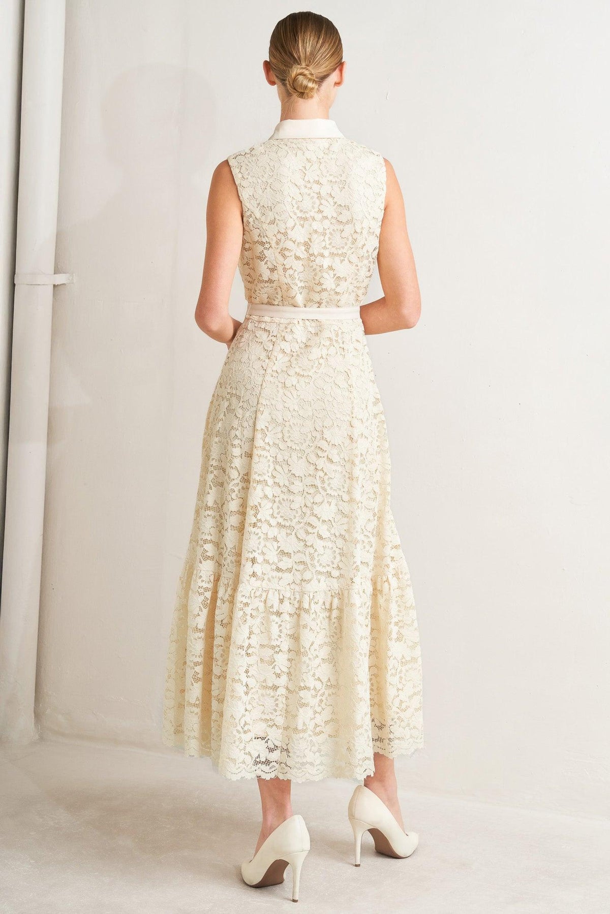 Cream woven lace midi dress by Flying Tomato featuring delicate lace details and a flowing silhouette.